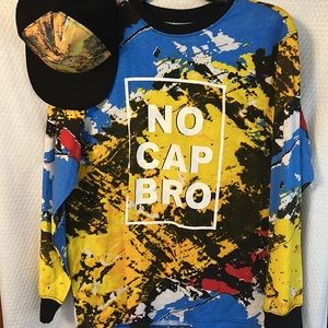 Brand new never used XL Graphic long sleeve T-shirt with snapback hat